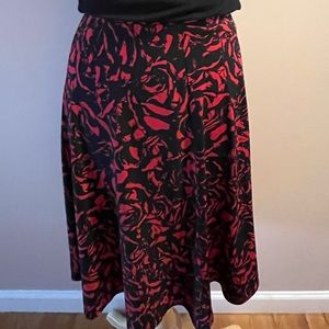 Very pretty,  skirt size small!!! Red/black perfect condition!
